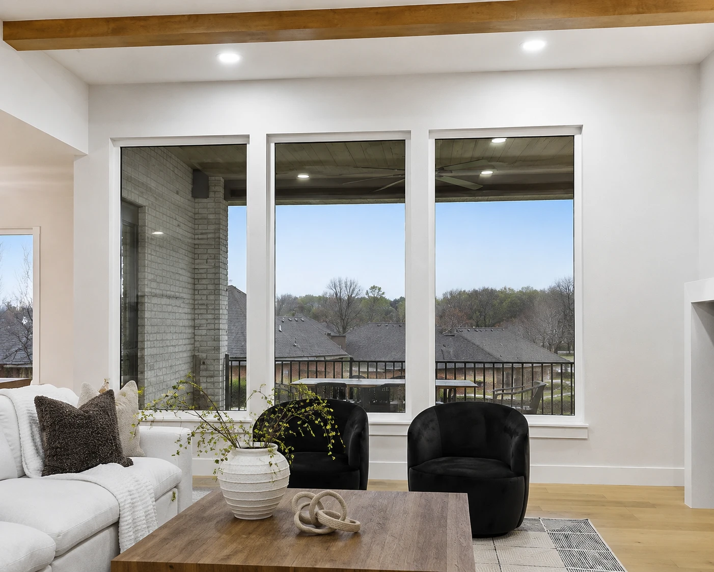 SwingTilt expansive fixed picture windows in a Springfield-area living room